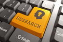 Orange Research Button on Computer Keyboard to Unlock IMT Custom Research